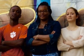 Students in front of mural